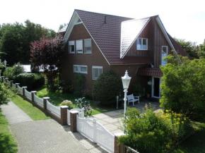 Отель Ferienhaus am Wäldchen  Нордерней